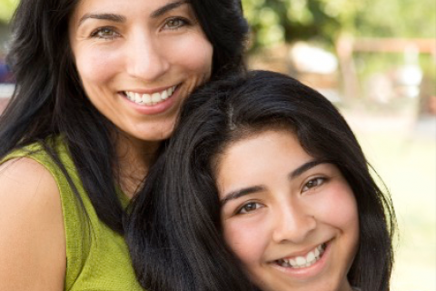 Happy mother and teenage daughter